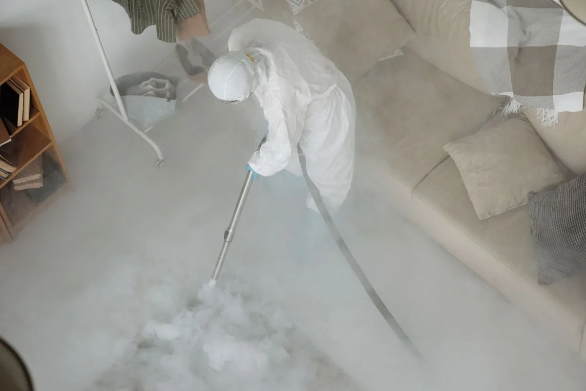 Biohazard cleanup technician in protective equipment, Chollas View, San Diego, CA
